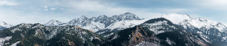 Beautiful mountain panorama with snow-capped peaks. View from Polana Rusinowa in the Tatra Mountains. Tatra National Park, Polandの写真素材