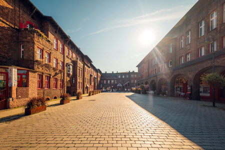 Katowice, Poland - August 05, 2023: Traditional, Silesian district Nikiszowiec. Renovated, old, brick block houses, build for coal miners in 1908-1919.Beautiful, afternoon light.のeditorial素材