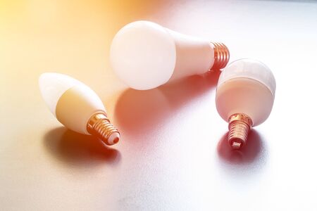 White light bulb lying on a desk, concept for ideas. Sunlight.の写真素材