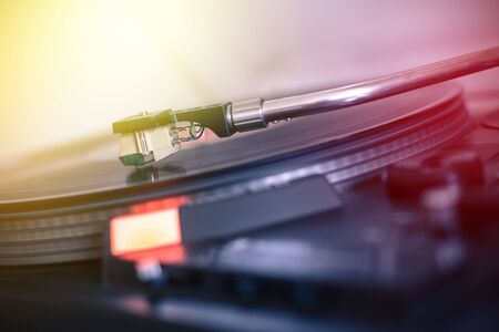 Close up picture of a record player, playing a record. Sunbeam.の写真素材