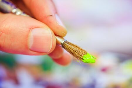 Artist paint brush on painting background. Painting therapy.の写真素材