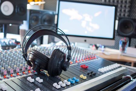 Professional sound recording studio: Headphones on a mixer desk, Radio