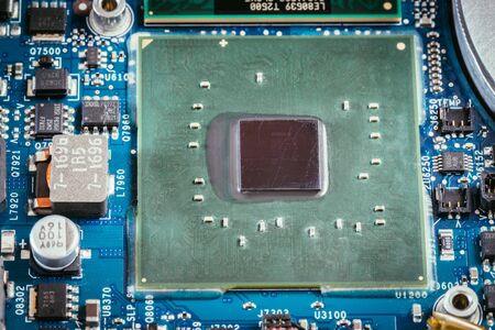 Computer chip on a circuit board, close up; Computer technology.の写真素材