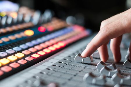 Professional music production in a sound recording studio, mixer deskの写真素材