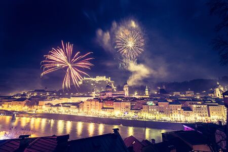 Colorful firework in the night: Old city of Salzburg and Festung Hohensalzburg at New Yearâs Eve. Magicの写真素材