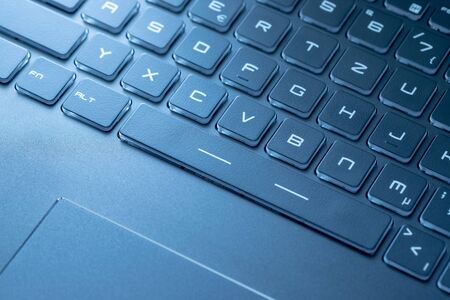 Laptop keyboard and touchpad: closeup picture 