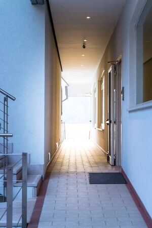 Bright passage between two buildings, natural lightの写真素材