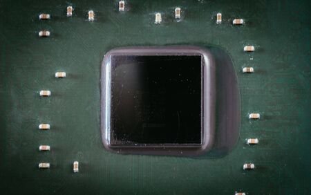 Computer chip on a circuit board, close up; Computer technology.