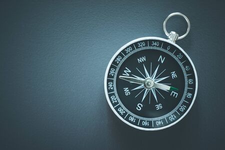 Close up of compass on an office desk, business & innovationの写真素材