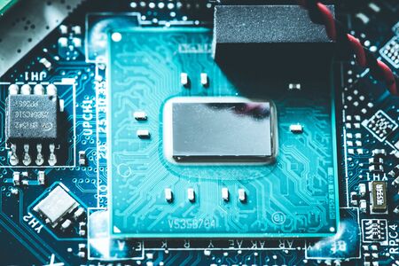 Computer chip on a circuit board, close up; Computer technology.