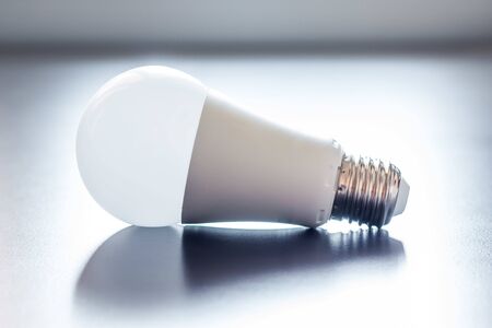 White light bulb lying on a desk, concept for ideasの写真素材