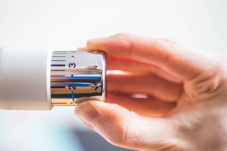Close up picture of a heat regulator. Good indoor climate. On.の写真素材