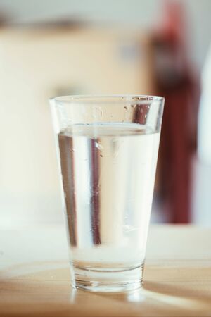 Clear glass of fresh, cold waterの写真素材