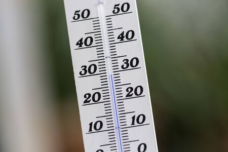 Thermometer close up picture in summer time, blurry backgroundの写真素材