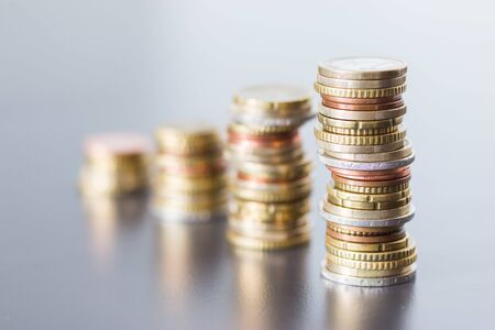 Coins stacked on each other, close up picture, money conceptの写真素材