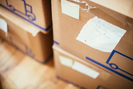 Move. Cardboard, boxes and stuff for moving into a new homeの写真素材