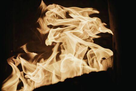 Blaze fire flame background and textured, orange and blackの写真素材