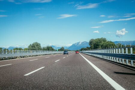 Highway on a sunny summer day, travellingの写真素材