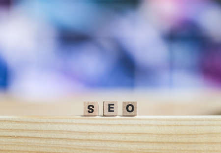 Wood cubes with the word âSEOâ, close up picture with copy space. Search engine optimization.の写真素材