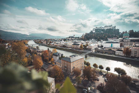 Salzburg historic district at autumn time, colorful leaves and colors with sunshine, Austriaの写真素材