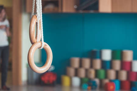 Close up of gym rings in the gym hall of a preschool