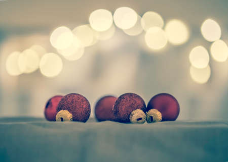 Red Christmas balls with decoration on shiny backgroundの写真素材
