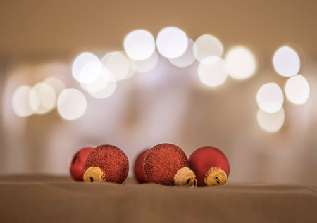Red Christmas balls with decoration on shiny backgroundの写真素材