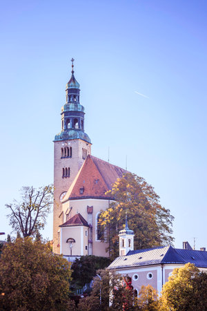 MÃ¼llner Church in Salzburg, Austria. Blue sky.の写真素材