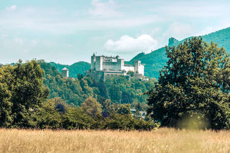 Fortress Hohensalzburg with mountains in the background, autumn timeのeditorial素材