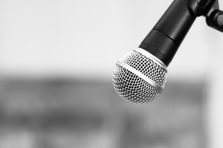 Black microphone on a tripod. Interview situation, copy space.の写真素材