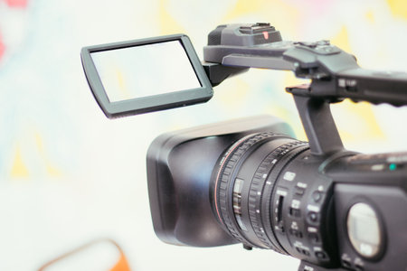 Film camera on a tripod at a mobile production, indoorの写真素材