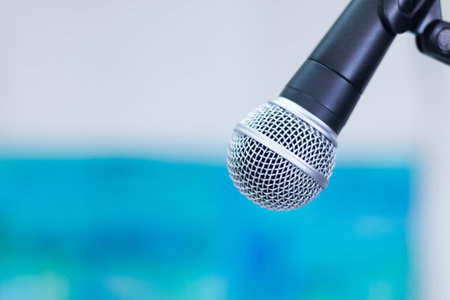 Black microphone on a tripod. Interview situation, copy space.の写真素材