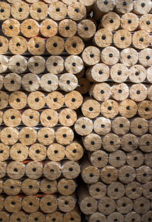 Wood briquettes for heating, packed in plastic film
