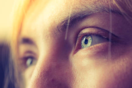 Feminine eyes, with blue iris, cut out of the face, healthcareの写真素材