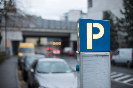Parking machine in the city street, eveningの写真素材
