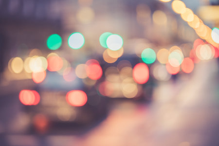 City traffic in the night, blurred with light pointsの写真素材