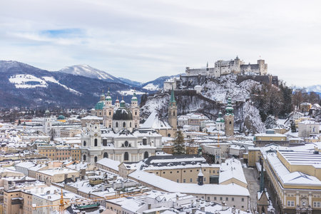 Panorama of Salzburg in winter: Snowy historical centerの写真素材