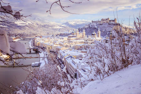Panorama of Salzburg in winter: Snowy historical center, sunshineのeditorial素材