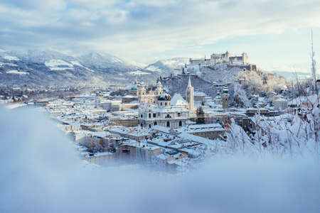 Panorama of Salzburg in winter: Snowy historical center, sunshineのeditorial素材