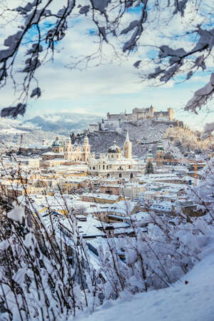 Panorama of Salzburg in winter: Snowy historical center, sunshineのeditorial素材