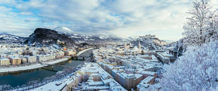 Panorama of Salzburg in winter: Snowy historical center, sunshineのeditorial素材