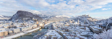 Panorama of Salzburg in winter: Snowy historical center, sunshineのeditorial素材