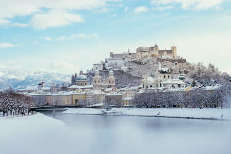 Panorama of Salzburg in winter: Snowy historical center, sunshineのeditorial素材