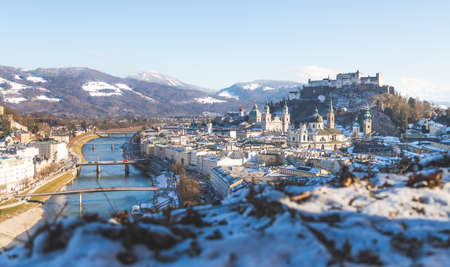 Panorama of Salzburg in winter: Snowy historical centerの写真素材