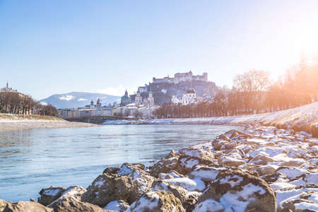 Panorama of Salzburg in winter, snow river bank, historical center, river Salzachのeditorial素材