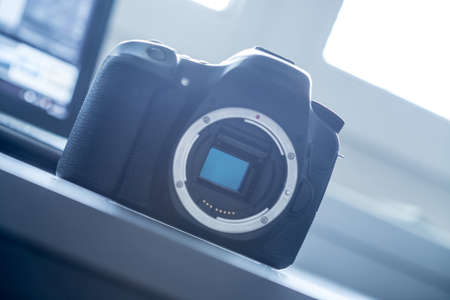 Professional reflex camera on a table, camera sensorの写真素材