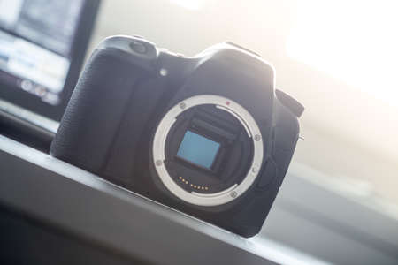 Professional reflex camera on a table, camera sensorの写真素材