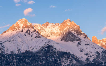Idyllic scenery with snowy mountains in the evening sun, Alps, Austria