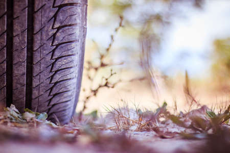 Car tire and sandy ground with text space, desertの写真素材