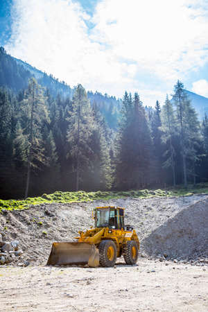 Wheel loader excavator is parking in a quarry